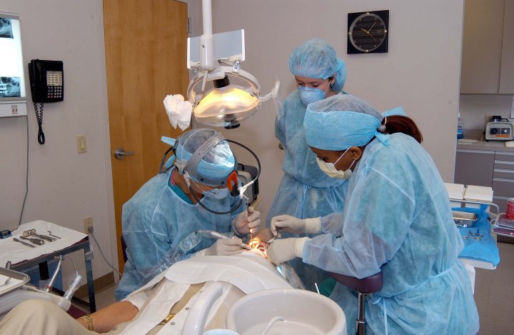 Dental clinicians practicing oral surgery skills as part of a Live Hands On Implant Surgical Program.